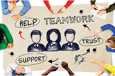 Concept drawing on table to being a team palyer at work.