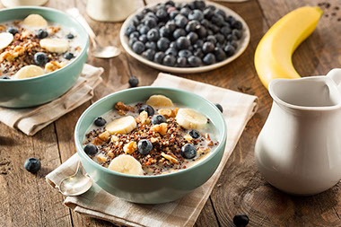 Image of oat cereal with fresh fruit.