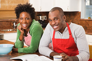 Image of couple in the kitchen. Image of couple in the kitchen.