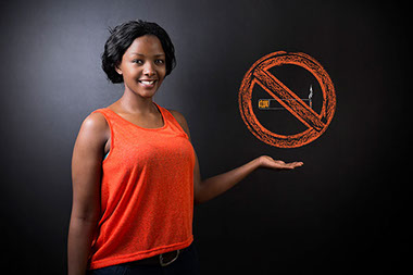 Image of women with no smoking sign.
