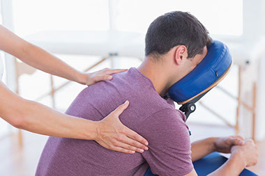 Man getting a chair massage.