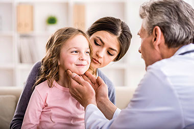Image of mother and child at the doctor's office.