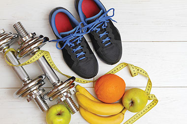 Image of athletic shoes, weight, and fruits. Image of athletic shoes, weight, and fruits.