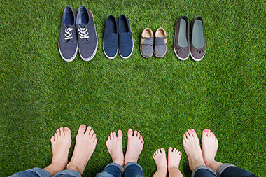 Image of bare feet on grass.