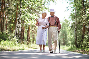 Elderly couple walking.