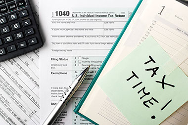 Image of paper work for taxes.