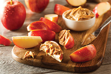 Image of fruit and peanut butter dip.