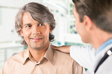 Understanding your gallbladder. Image of man talking to his doctor.