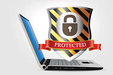 Image of laptop with shield and lock key.