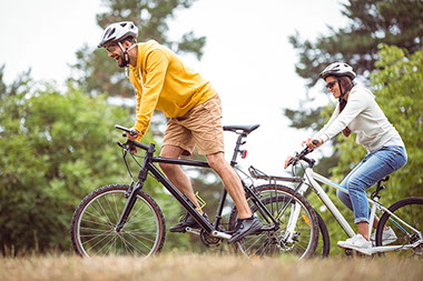 Couple enjoying a bike ride.