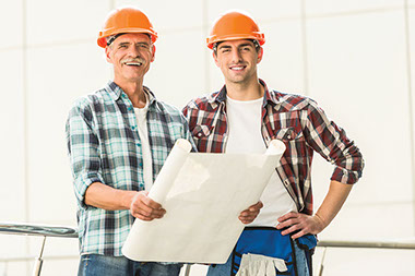 Image of 2 construction workers.