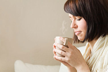 Image of women drinking hot tea.
