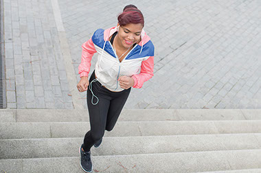 Image of women climbing stairs for exercise.