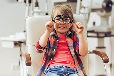 Young child at the eye doctor office. Young child at the eye doctor office.