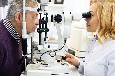 Image of mature male at eye doctor appointment. Image of mature male at eye doctor appointment.