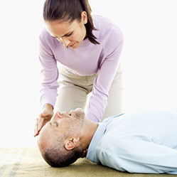 CPR. Image of opening a person's airway.