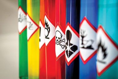 Image of posion cans with warning labels. Image of posion cans with warning labels.