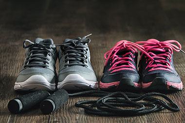 Two pairs of shoes and a jump rope.