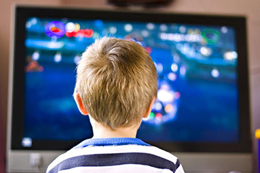 Image of boy watching TV.
