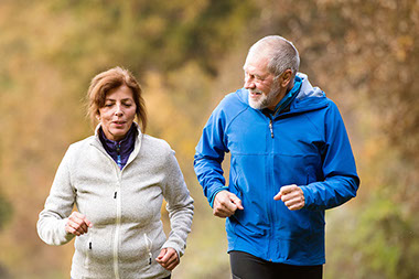 Couple jogging together.