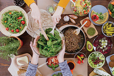 Table filled with healthy foods.