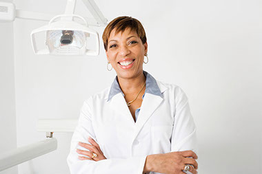 Image of smiling dentist.