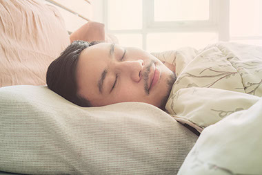 Image of man sleeping.