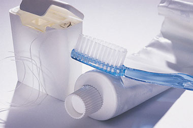 Image of toothbrush and toothpaste with floss. Image of toothbrush and toothpaste with floss.
