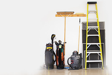 Image of items stored in a garage, such as a ladder.