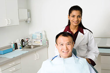 Image of dentist with a patient.