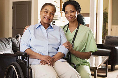 Image of nurse with wheelchair bound women. Image of nurse with wheelchair bound women.