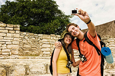 Image of couple taking a selfie on vacation. Image of couple taking a selfie on vacation.