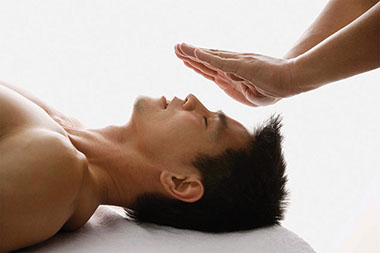 Image of person having healing touch therapy. Image of person having healing touch therapy.