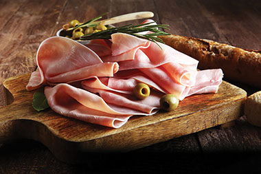 Turkey deli on cutting board.