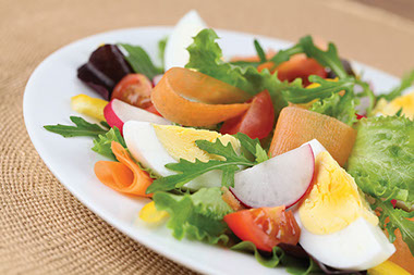 Image of salad with hard boil eggs.