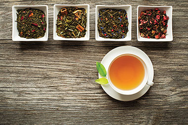 Image of tea and different tea leaves.