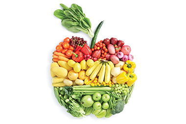 Image of different vegetables shaped into an apple.