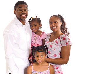 Strike the right cord. Image of young smiling family.