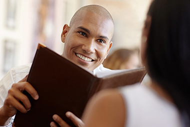 Image of a couple dining out.