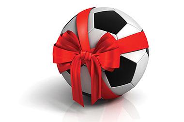 Wellness gifts. Image of soccer ball with ribbon around it.