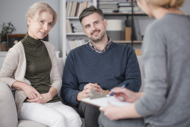Image of a couple with a marriage counselor.