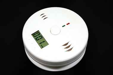 Prevent carbon monoxide poisoning. Image of carbon monoxide detector.