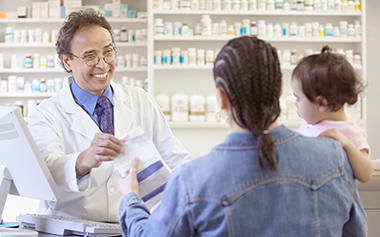 Image of mother and daughter at the pharmacy.