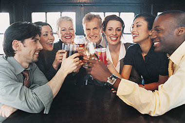 Image of a group of co-workers drinking after hours.