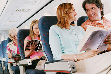 Passengers aboard an airplane.