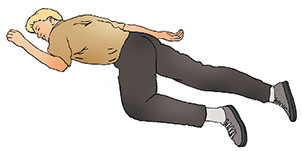 Illustration on how to put a person in a recovery position.