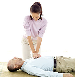 First Aid for Choking. Image of adult chest compressions.